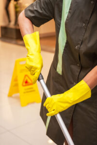 Janitor cleaning bank